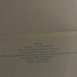 Party Lite wall sconce. Black, scroll pattern. New in box.